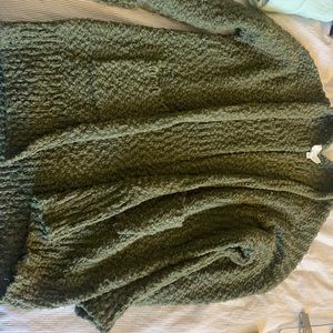 Green boucle grandpa sweater